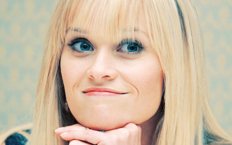 woman with blonde hair and blue eyes