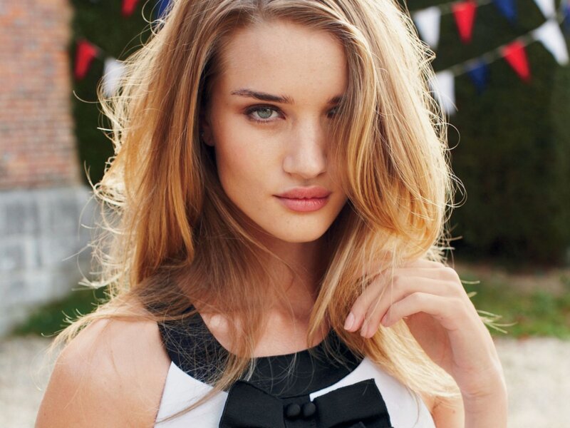 woman with blonde hair and bow