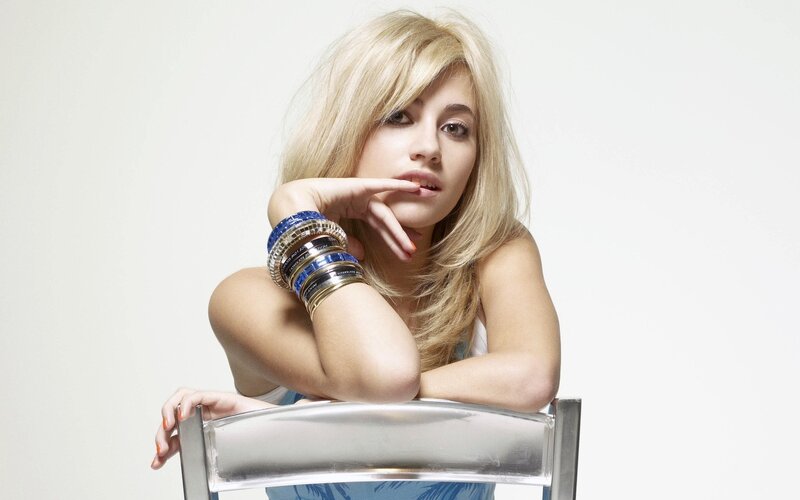 woman with blonde hair and bracelets