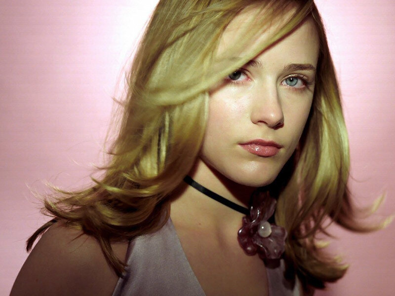 woman with blonde hair and choker