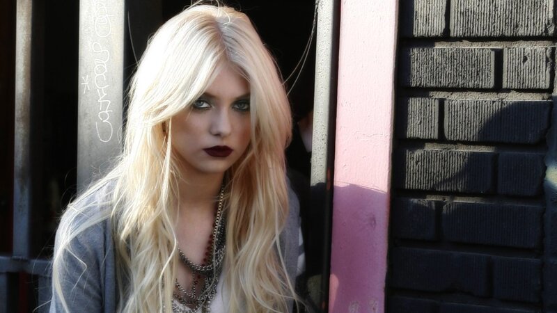 woman with blonde hair and dark lipstick
