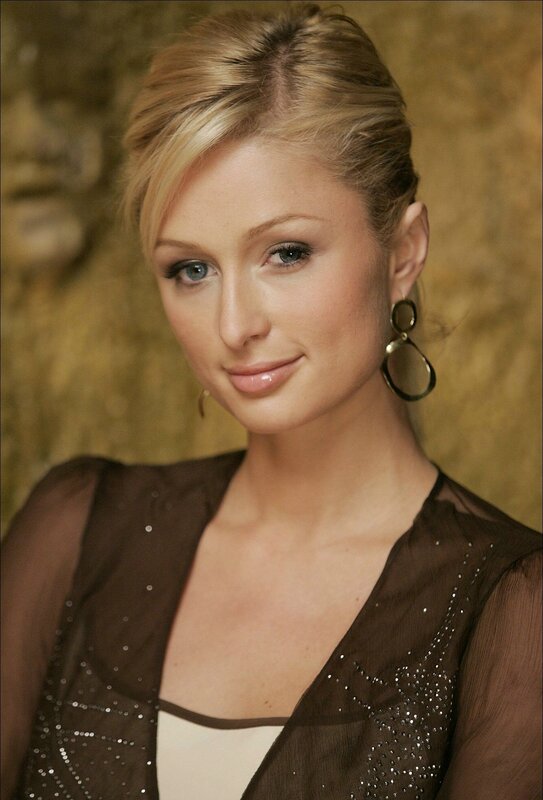 woman with blonde hair and earrings