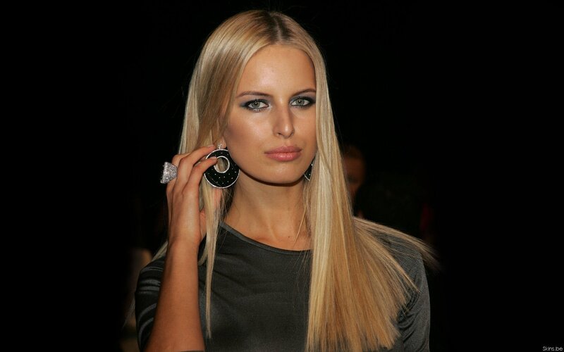 woman with blonde hair and earrings