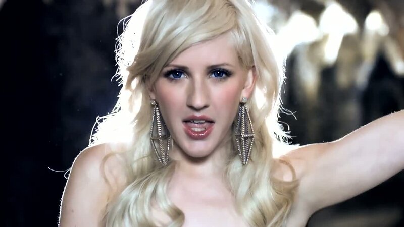 woman with blonde hair and earrings