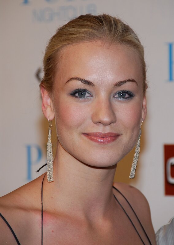 woman with blonde hair and earrings