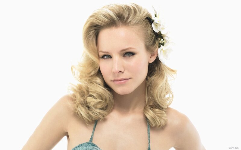 woman with blonde hair and flower