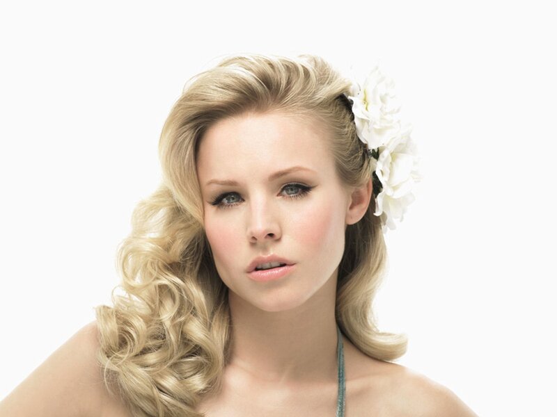 woman with blonde hair and flowers