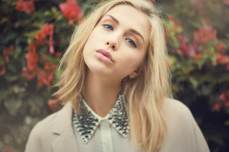 woman with blonde hair and flowers