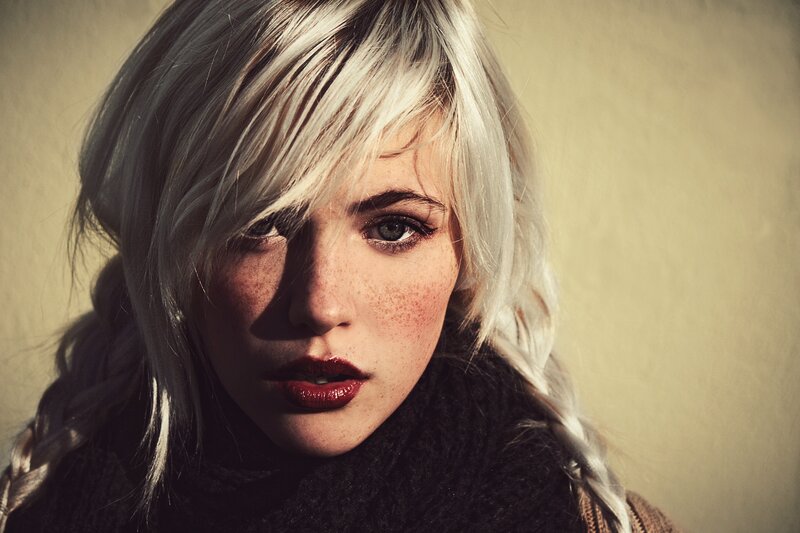 woman with blonde hair and freckles