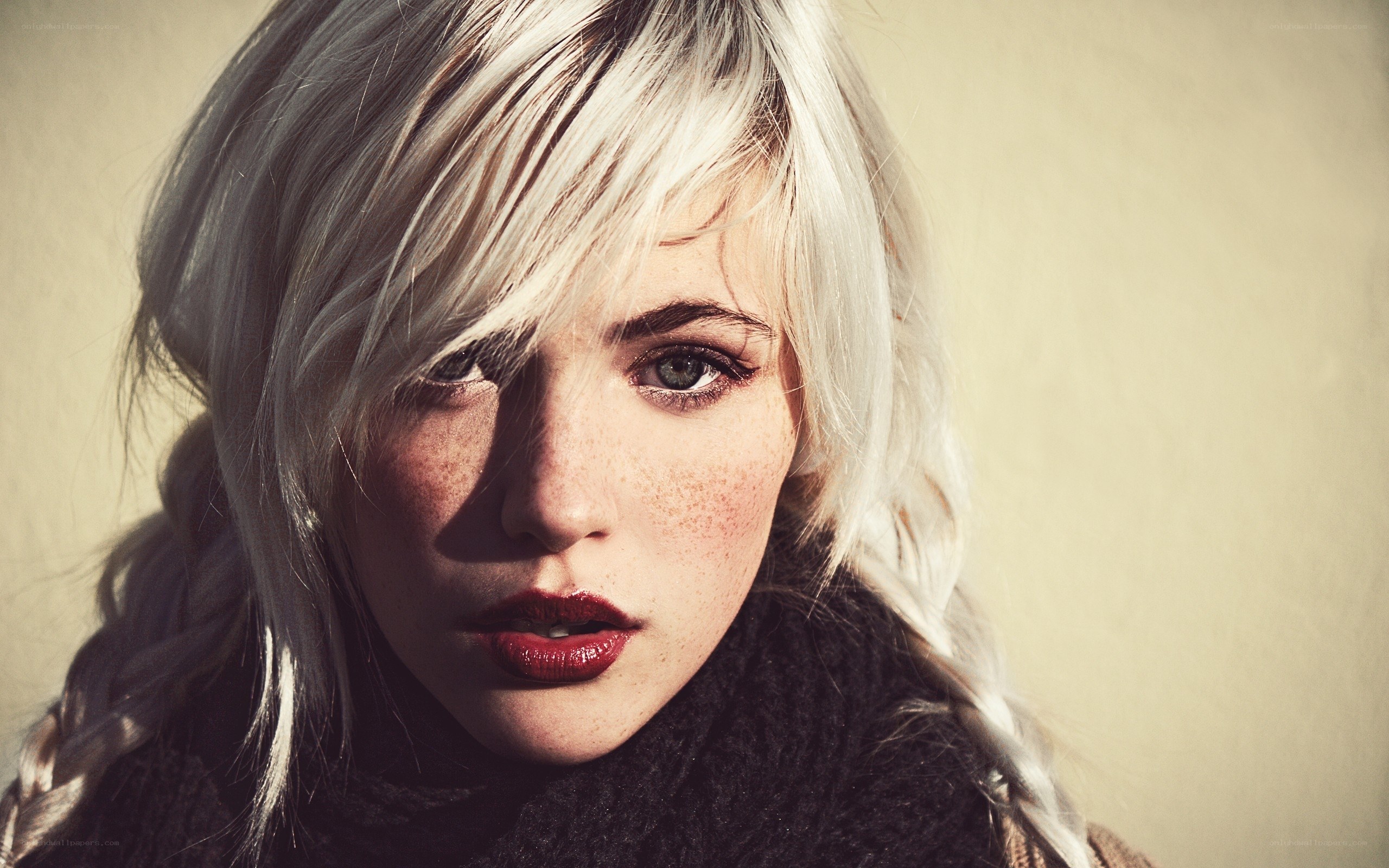 woman with blonde hair and freckles