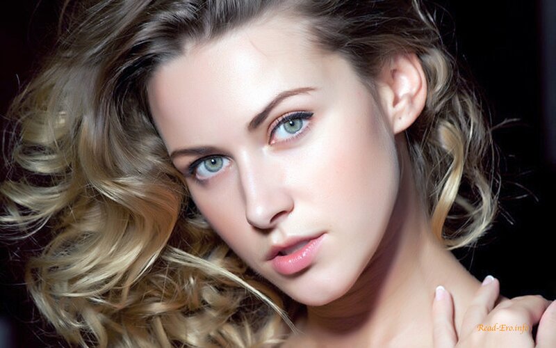 woman with blonde hair and green eyes