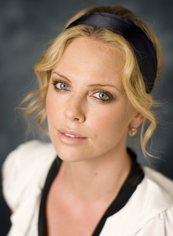 woman with blonde hair and green eyes