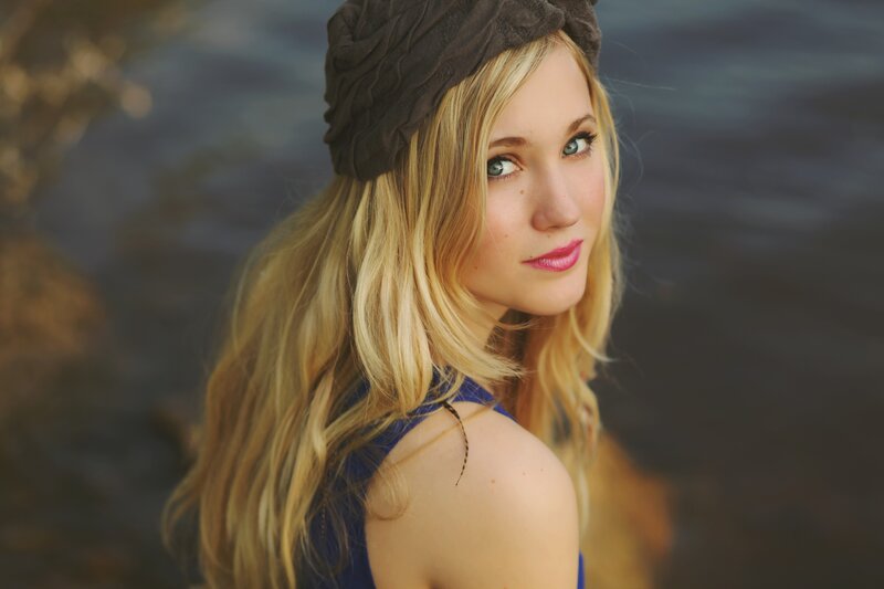 woman with blonde hair and headband