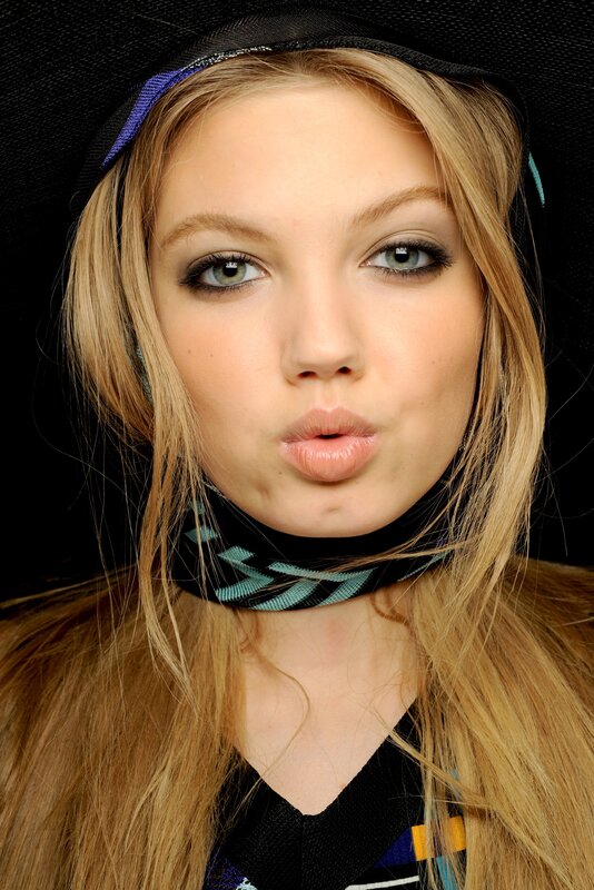 woman with blonde hair and headband