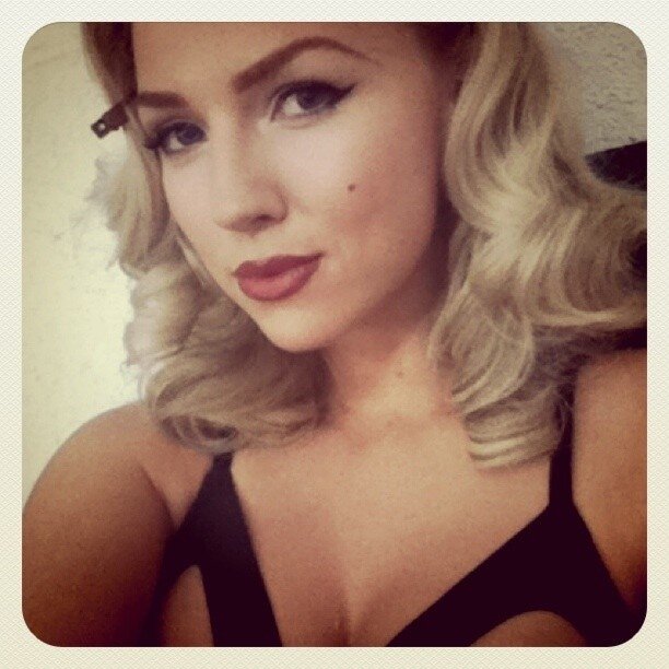 woman with blonde hair and makeup