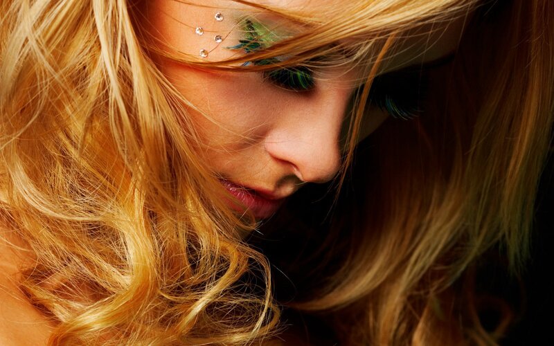 woman with blonde hair and makeup