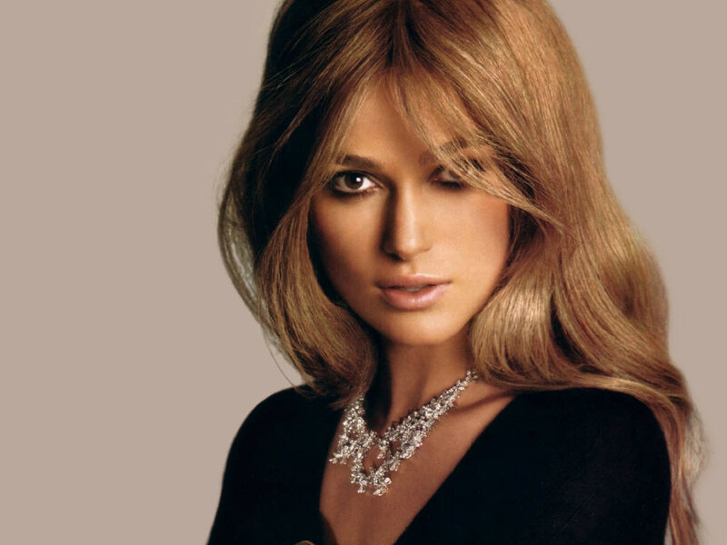 woman with blonde hair and necklace