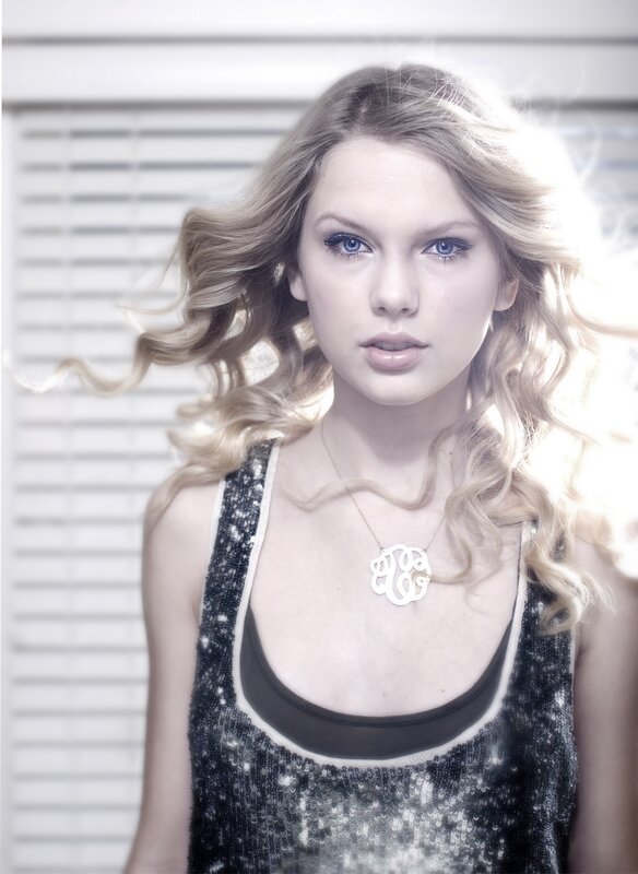 woman with blonde hair and necklace