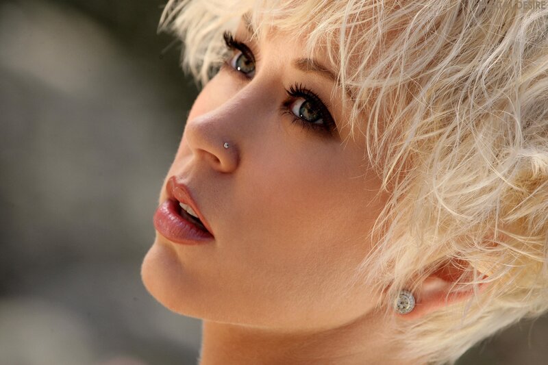 woman with blonde hair and nose piercing