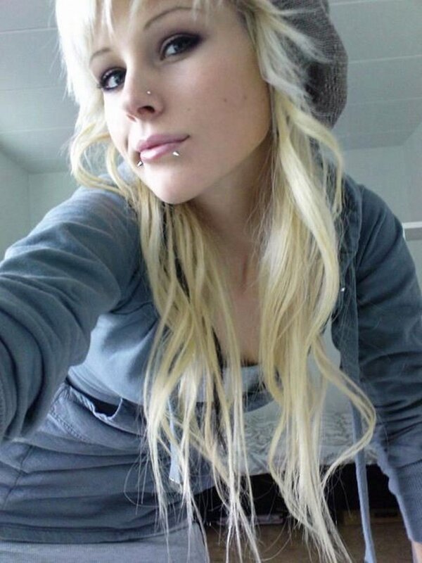 woman with blonde hair and piercings