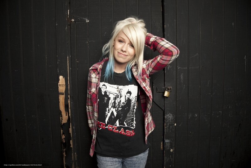 woman with blonde hair and plaid shirt