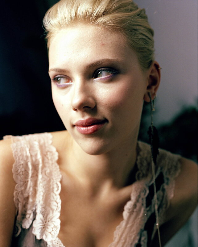 woman with blonde hair and purple eyeshadow
