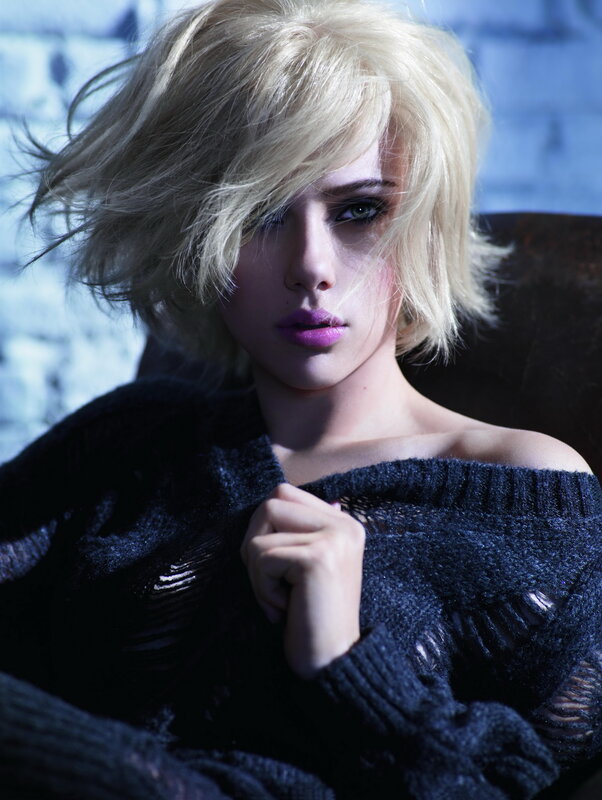 woman with blonde hair and purple lips