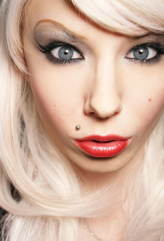 woman with blonde hair and red lipstick