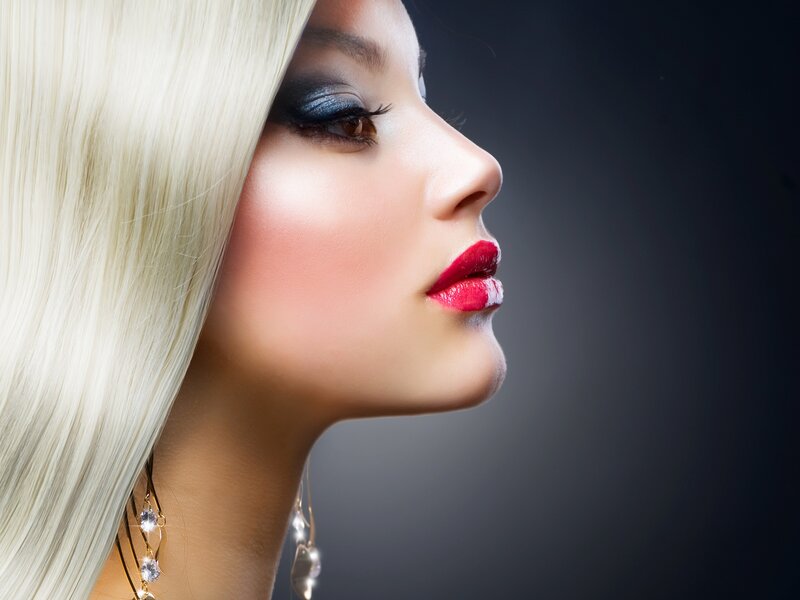 woman with blonde hair and red lipstick