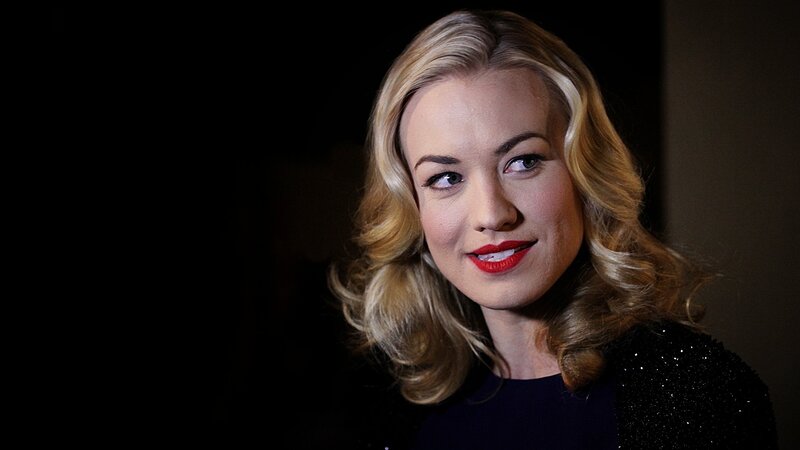 woman with blonde hair and red lipstick