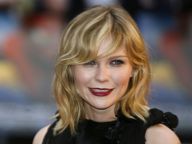 woman with blonde hair and red lipstick