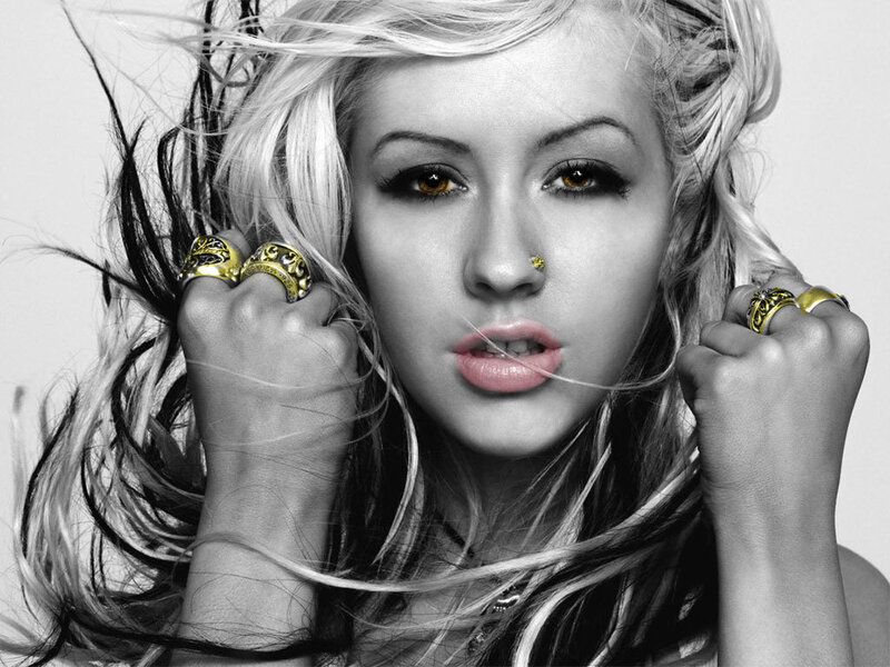 woman with blonde hair and rings