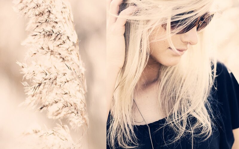 woman with blonde hair and sunglasses