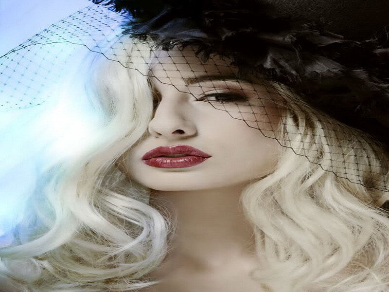 woman with blonde hair and veil