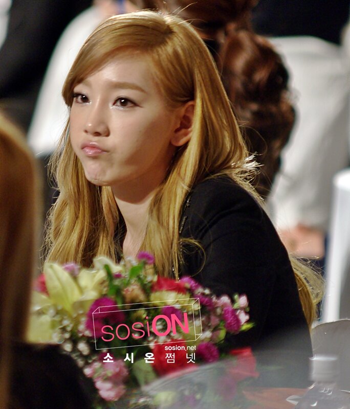 woman with blonde hair at event