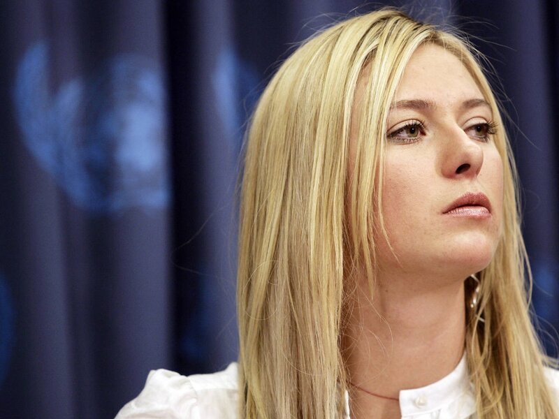 woman with blonde hair at event