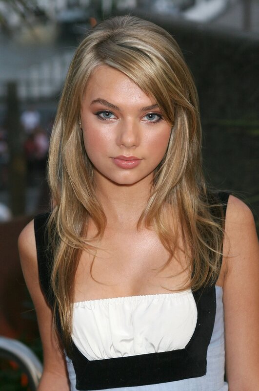 woman with blonde hair at event