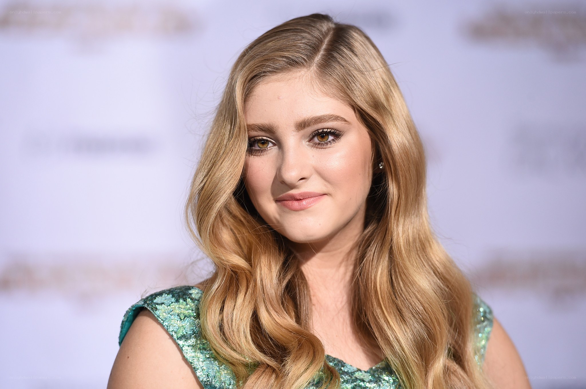 woman with blonde hair at event