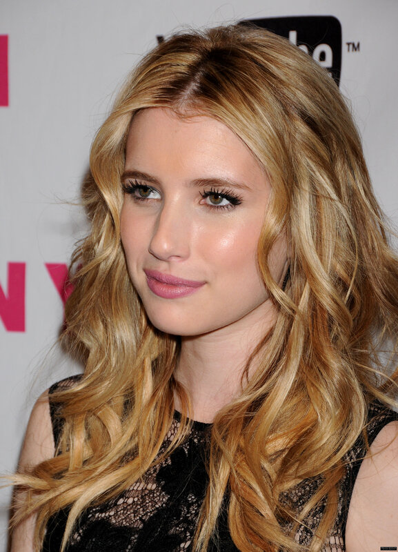 woman with blonde hair at event