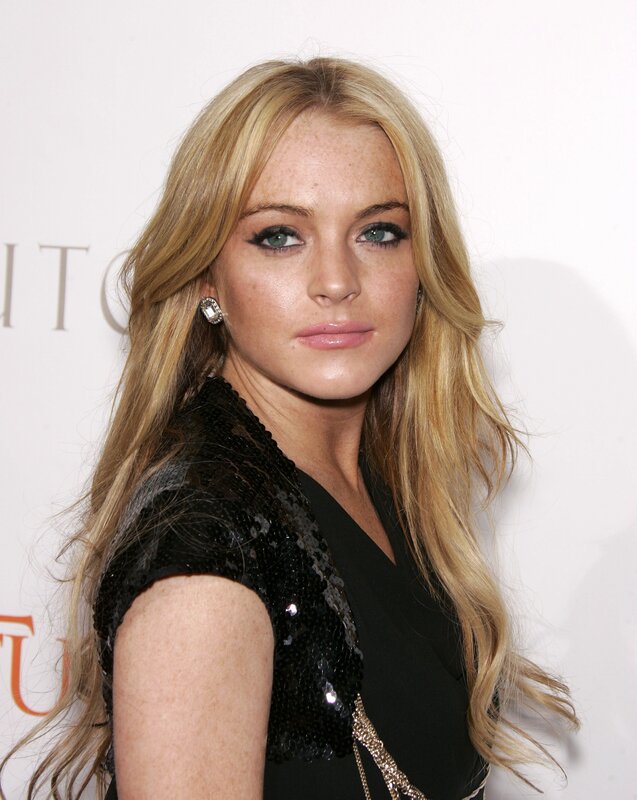 woman with blonde hair at event