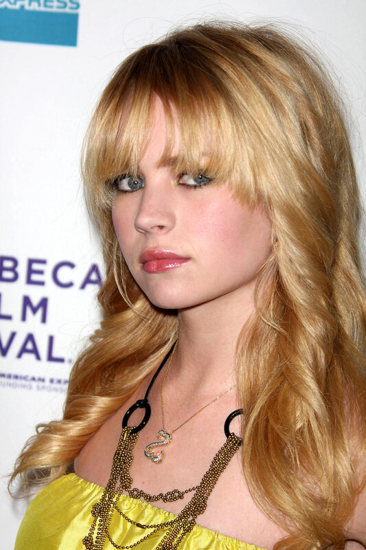 woman with blonde hair at event