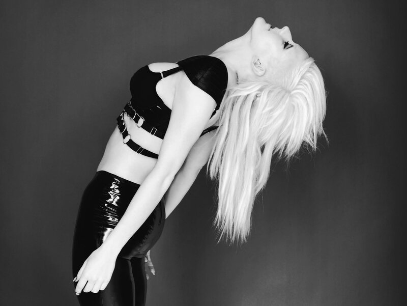 Woman with Blonde Hair — Black, Dramatic, Photograph, Black Top, Latex Pants