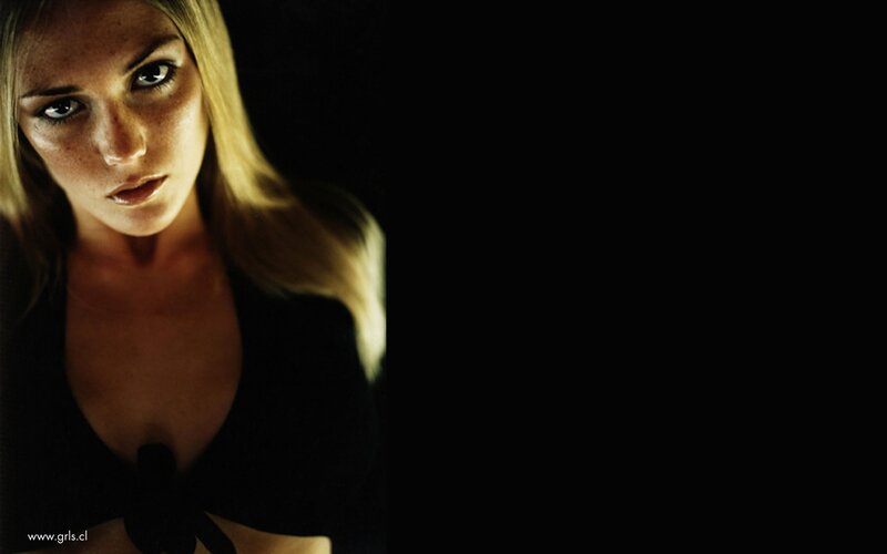 Woman with Blonde Hair — Black, Dramatic, Photograph, Blonde Hair, Black Top, Dark Background, Yellow