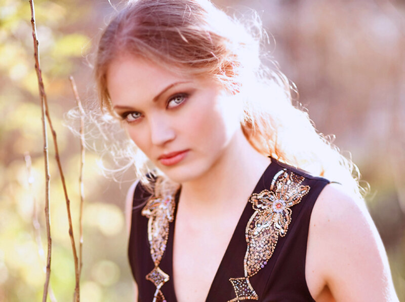 Woman with Blonde Hair — Black, Serene, Sunset