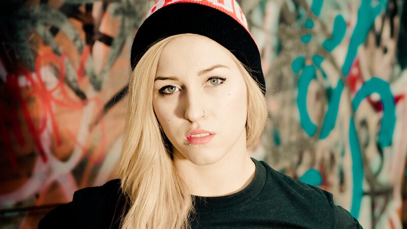 Woman with Blonde Hair — Black, Serious, Photograph, Beanie