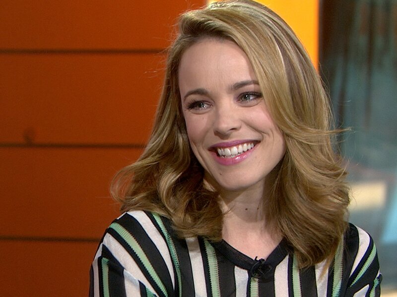Woman with Blonde Hair — Black, Smiling, Photograph, Striped Shirt