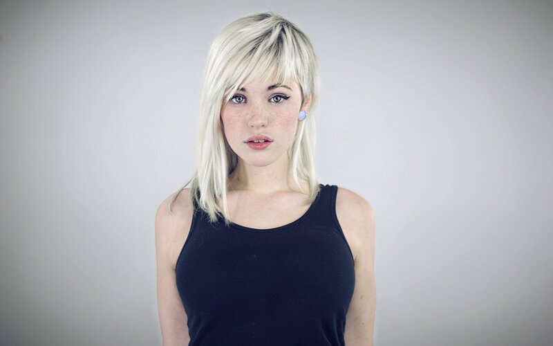Woman with Blonde Hair — Black Tank Top
