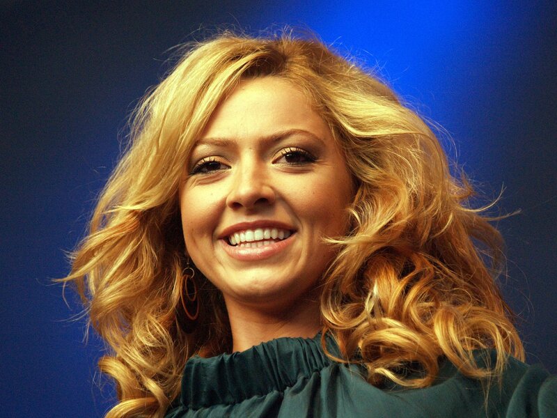 Woman with Blonde Hair — Blue, Happy, Photograph, Blonde Hair, Smile, Earring, Gold