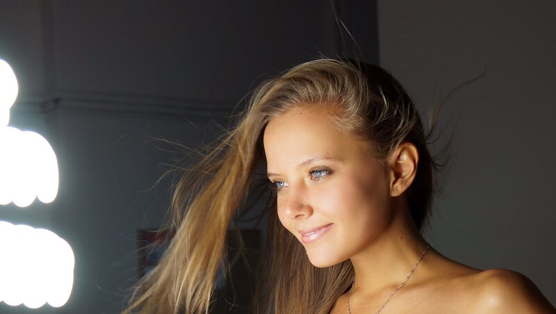 Woman with Blonde Hair — Brown, Dramatic, Photograph, Light Bulbs