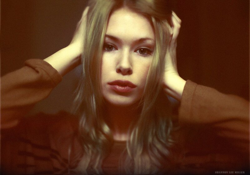 Woman with Blonde Hair — Brown, Intense, Photograph, Hands